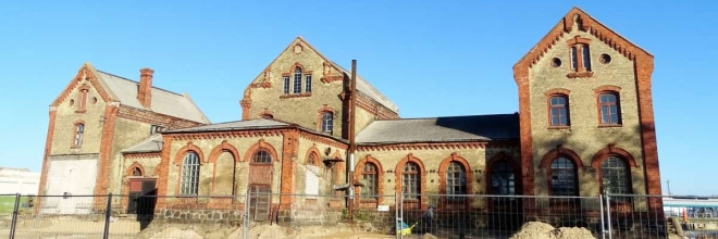 Turpinās Ostas ielas izbūves un vēsturisko Jūras darbnīcu teritorijas labiekārtošanas darbi