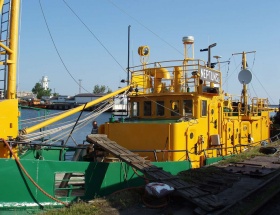 Industrial diving, the Freeport of Ventspils, professional industrial divers,diving support ship Neptuns, underwater ship repairs, search and recovery of sunken objects 